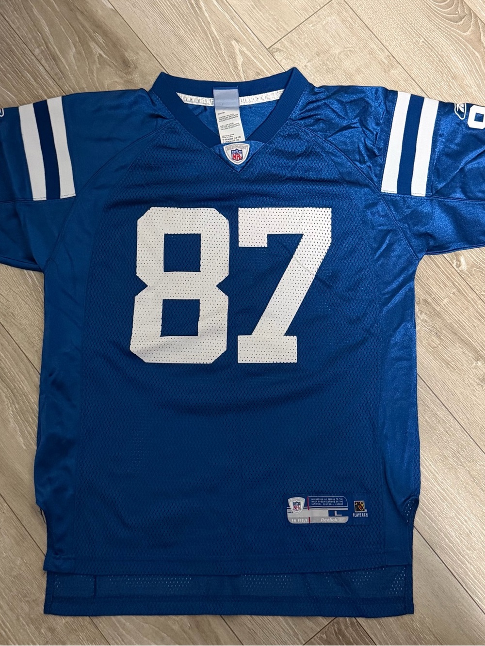 Reebok Blue youth Football Jersey with White #87